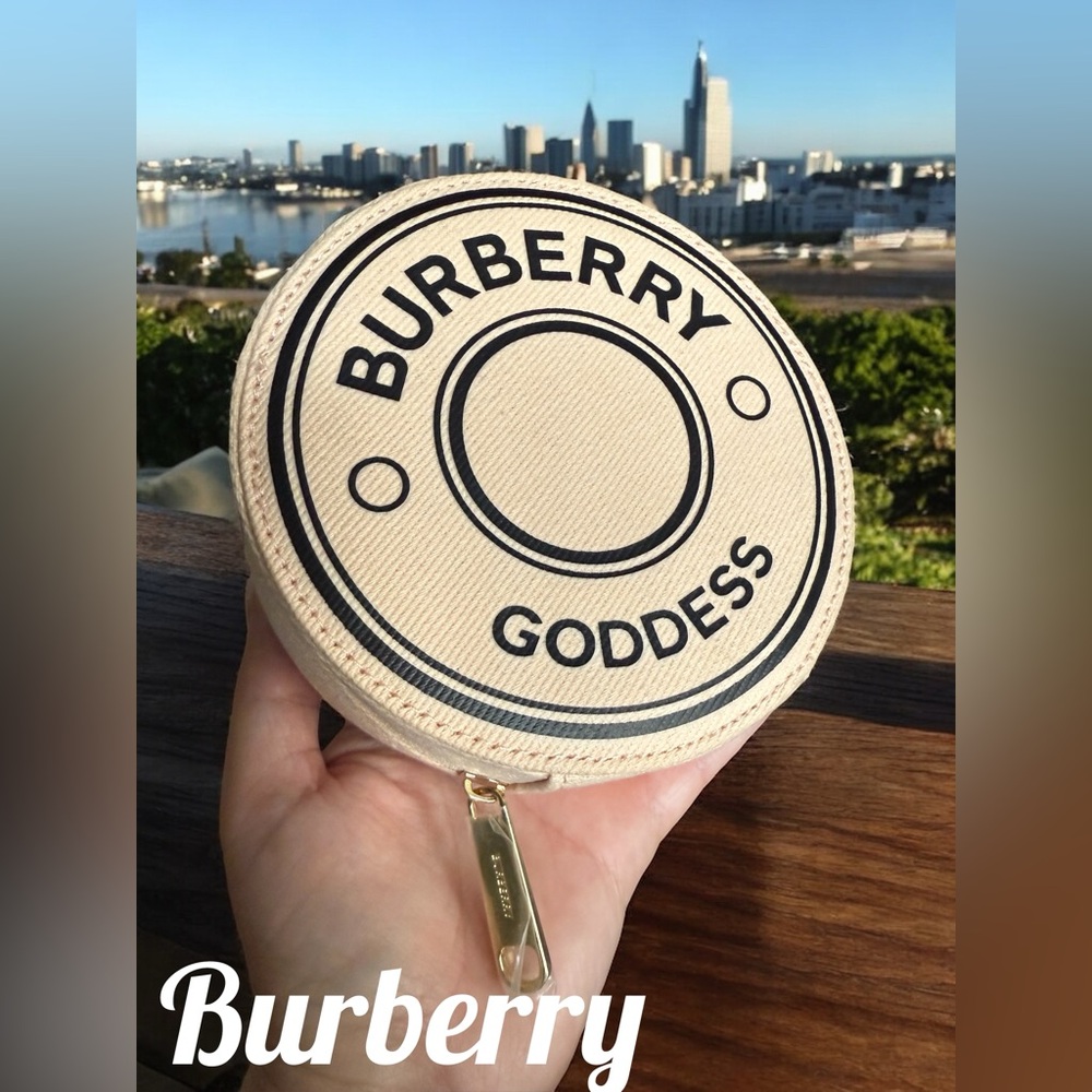 Burberry Cream Circular Jewelry Clutch Case with Gold Tone Branded Accents